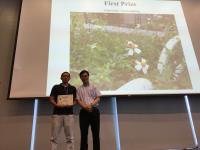 Dr. Lu Zengbing, First Prize winner (left) receives the certificate from Prof. Woody Chan